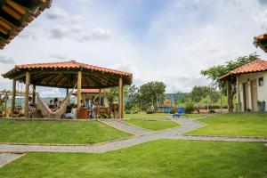 a pavilion with a playground in a park at Espaço Amplitude in Sobradinho