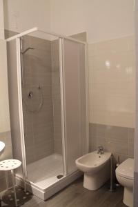 a bathroom with a shower and a toilet and a sink at Sogni d'Assisi in Assisi