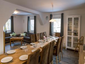 a dining room with a table and chairs at Mill Pond Luxury Escape in Hemschlar