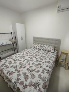Katil atau katil-katil dalam bilik di Apartamento na Ponta Neegra Melhor Vista Ultimo Andar +30 gambar