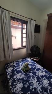 Postel nebo postele na pokoji v ubytování Casa em Jacarepaguá excelente para desfrutar o Rio de Janeiro