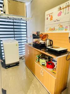 Kuchyň nebo kuchyňský kout v ubytování Căn hộ dịch vụ bs8