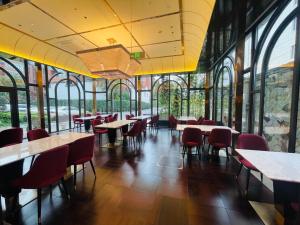 Restoran või mõni muu söögikoht majutusasutuses Tianyongge Art Hotel Shanghai Disney Store