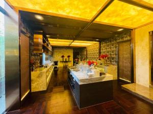 Kuchyň nebo kuchyňský kout v ubytování Tianyongge Art Hotel Shanghai Disney Store