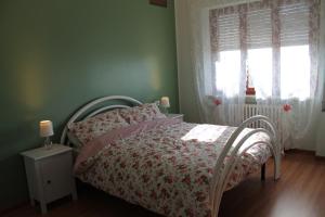 Cama ou camas em um quarto em Sogni d'Assisi