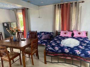 Katil atau katil-katil dalam bilik di Henz and Sia Guesthouse