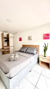 Rúm í herbergi á HOSTELFC CORFERIAS