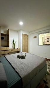 Rúm í herbergi á HOSTELFC CORFERIAS
