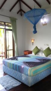 Rice Villa Retreatにあるベッド