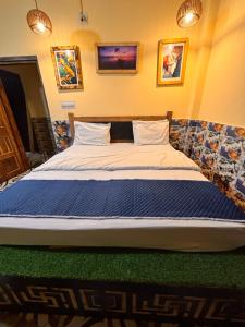 Voodi või voodid majutusasutuse Plush hotels toas