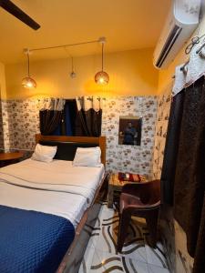 Voodi või voodid majutusasutuse Plush hotels toas