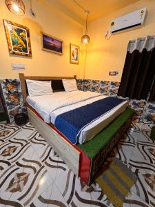 Voodi või voodid majutusasutuse Plush hotels toas