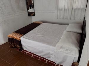 Postel nebo postele na pokoji v ubytování Posada Quetzalin