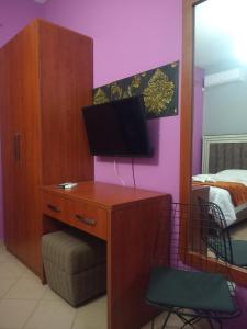 TV o dispositivi per l'intrattenimento presso Prince Hotel Fier
