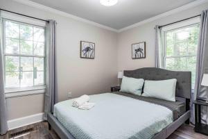 Voodi või voodid majutusasutuse Stylish 2 bedroom bungalow in Durham toas