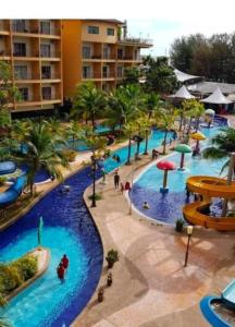 an overhead view of a large swimming pool at a resort at CStone Legacy Gold Coast Morib Resort in Banting