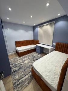 Postel nebo postele na pokoji v ubytování 3 комнатная квартира в Андижане