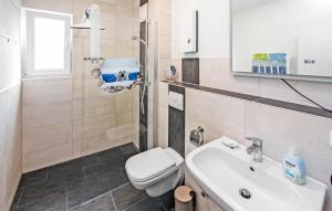 Koupelna v ubytování Ferienwohnung Graal-Müritz + 7 fotografií