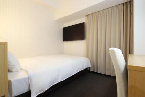 Katil atau katil-katil dalam bilik di AB Hotel Kani