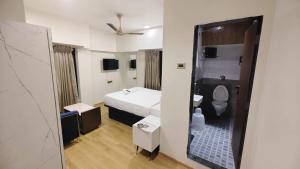4 Points Lodging & Boarding房間的床