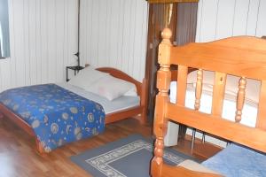 Postel nebo postele na pokoji v ubytování Maison chaleureuse à Saint Louis