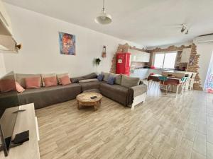 Area soggiorno di Cozy appartament sea view