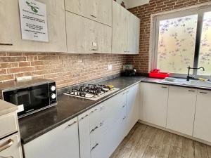 Cucina o angolo cottura di Cozy appartament sea view