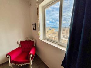 Area soggiorno di Cozy appartament sea view