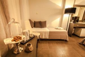 Postel nebo postele na pokoji v ubytování Aqua Mare Sea Side Rooms