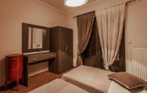 Postel nebo postele na pokoji v ubytování Aqua Mare Sea Side Rooms