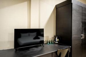 TV a/nebo společenská místnost v ubytování Simply Stay Chaweng