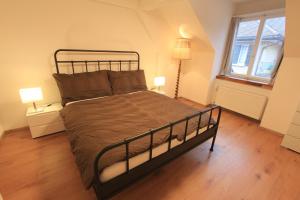 Postel nebo postele na pokoji v ubytování Ferienwohnung am Walensee