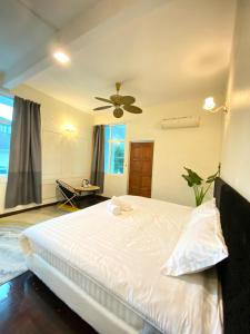 Postel nebo postele na pokoji v ubytování Seahome Boutique Hotel