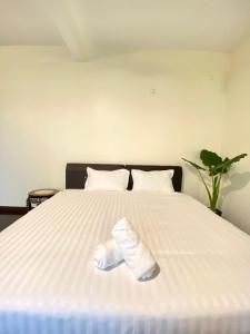 Postel nebo postele na pokoji v ubytování Seahome Boutique Hotel
