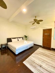 Postel nebo postele na pokoji v ubytování Seahome Boutique Hotel