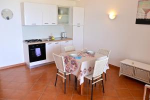 Kuchyň nebo kuchyňský kout v ubytování Porto Antigo II Ocean Appartment + 4 fotografie