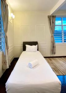 Postel nebo postele na pokoji v ubytování Seahome Boutique Hotel