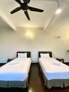 Postel nebo postele na pokoji v ubytování Seahome Boutique Hotel