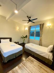 Postel nebo postele na pokoji v ubytování Seahome Boutique Hotel