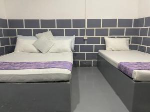 Postel nebo postele na pokoji v ubytování Edy's Nest + 13 fotografií
