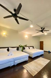 Postel nebo postele na pokoji v ubytování Seahome Boutique Hotel