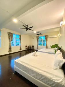Postel nebo postele na pokoji v ubytování Seahome Boutique Hotel