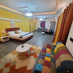 Ένα ή περισσότερα κρεβάτια σε δωμάτιο στο Burj maison d'hôtes