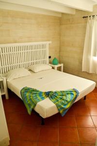 Postel nebo postele na pokoji v ubytování Porto Antigo II Poolside Appartment + 9 fotografií