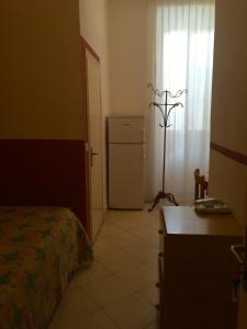 Kuchyň nebo kuchyňský kout v ubytování Albergo Ape Elbana