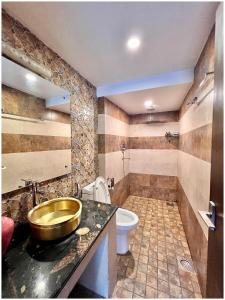 Koupelna v ubytování Satkar Boutique Home