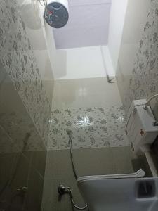 Koupelna v ubytování Ramaya Homestay