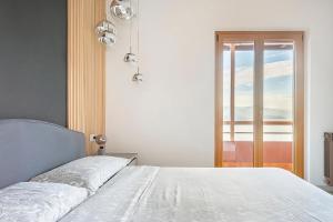Voodi või voodid majutusasutuse Happy Guest Apartments - Dolce Vista toas