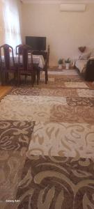 Ruang duduk di Apartment at Narimanov 151