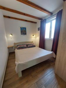 Postel nebo postele na pokoji v ubytování Garden apartmant near sea + 11 fotografií